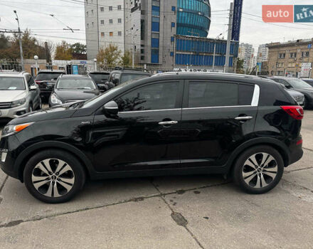 Черный Киа Sportage, объемом двигателя 2.4 л и пробегом 173 тыс. км за 12990 $, фото 3 на Automoto.ua