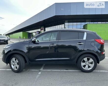 Чорний Кіа Sportage, об'ємом двигуна 2 л та пробігом 341 тис. км за 10600 $, фото 6 на Automoto.ua