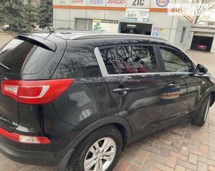 Черный Киа Sportage, объемом двигателя 2 л и пробегом 200 тыс. км за 13200 $, фото 2 на Automoto.ua