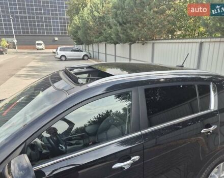 Чорний Кіа Sportage, об'ємом двигуна 2 л та пробігом 174 тис. км за 16799 $, фото 42 на Automoto.ua