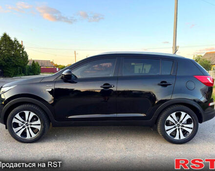 Чорний Кіа Sportage, об'ємом двигуна 2 л та пробігом 155 тис. км за 11800 $, фото 6 на Automoto.ua