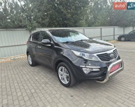 Чорний Кіа Sportage, об'ємом двигуна 2 л та пробігом 174 тис. км за 16799 $, фото 18 на Automoto.ua