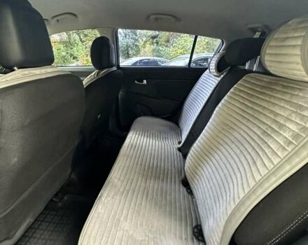 Чорний Кіа Sportage, об'ємом двигуна 2 л та пробігом 160 тис. км за 14500 $, фото 1 на Automoto.ua