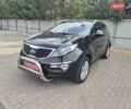 Чорний Кіа Sportage, об'ємом двигуна 2 л та пробігом 174 тис. км за 16799 $, фото 1 на Automoto.ua