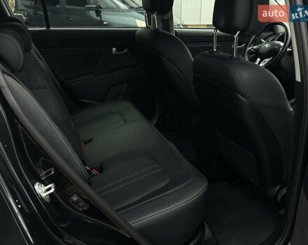 Чорний Кіа Sportage, об'ємом двигуна 2 л та пробігом 225 тис. км за 14500 $, фото 44 на Automoto.ua