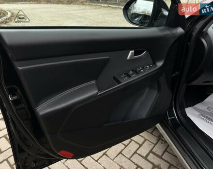 Чорний Кіа Sportage, об'ємом двигуна 2 л та пробігом 225 тис. км за 14500 $, фото 24 на Automoto.ua