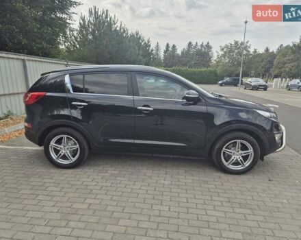 Чорний Кіа Sportage, об'ємом двигуна 2 л та пробігом 174 тис. км за 16799 $, фото 15 на Automoto.ua