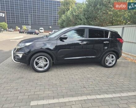 Чорний Кіа Sportage, об'ємом двигуна 2 л та пробігом 174 тис. км за 16799 $, фото 4 на Automoto.ua