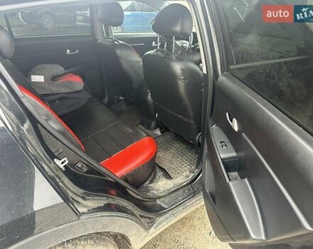 Черный Киа Sportage, объемом двигателя 1.69 л и пробегом 253 тыс. км за 10000 $, фото 1 на Automoto.ua