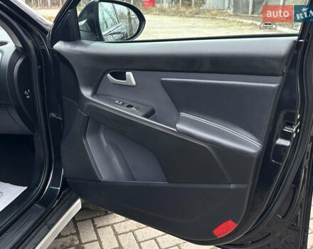 Чорний Кіа Sportage, об'ємом двигуна 2 л та пробігом 225 тис. км за 14500 $, фото 43 на Automoto.ua