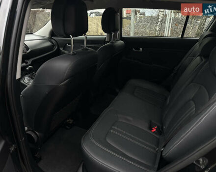 Чорний Кіа Sportage, об'ємом двигуна 2 л та пробігом 225 тис. км за 14500 $, фото 25 на Automoto.ua