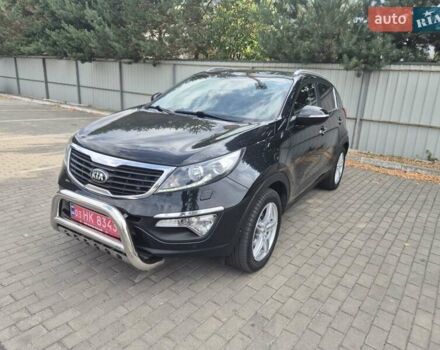 Чорний Кіа Sportage, об'ємом двигуна 2 л та пробігом 174 тис. км за 16799 $, фото 1 на Automoto.ua