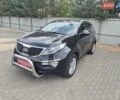 Чорний Кіа Sportage, об'ємом двигуна 2 л та пробігом 174 тис. км за 16799 $, фото 1 на Automoto.ua