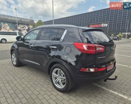 Чорний Кіа Sportage, об'ємом двигуна 2 л та пробігом 174 тис. км за 16799 $, фото 10 на Automoto.ua