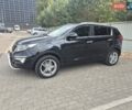 Чорний Кіа Sportage, об'ємом двигуна 2 л та пробігом 174 тис. км за 16799 $, фото 2 на Automoto.ua