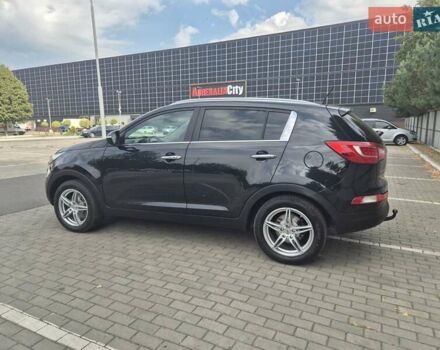 Чорний Кіа Sportage, об'ємом двигуна 2 л та пробігом 174 тис. км за 16799 $, фото 7 на Automoto.ua