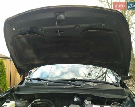 Черный Киа Sportage, объемом двигателя 1.69 л и пробегом 213 тыс. км за 13350 $, фото 43 на Automoto.ua