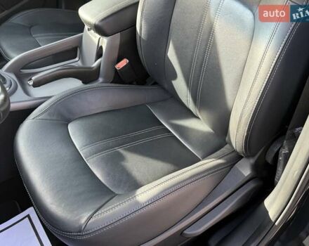 Чорний Кіа Sportage, об'ємом двигуна 2 л та пробігом 147 тис. км за 16900 $, фото 47 на Automoto.ua