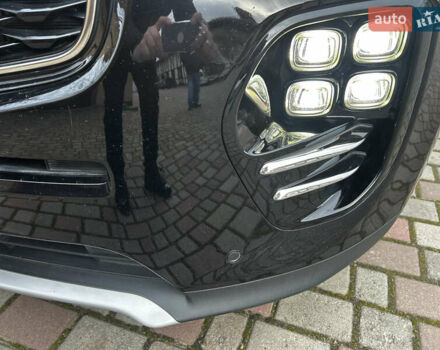 Чорний Кіа Sportage, об'ємом двигуна 2 л та пробігом 176 тис. км за 17600 $, фото 22 на Automoto.ua