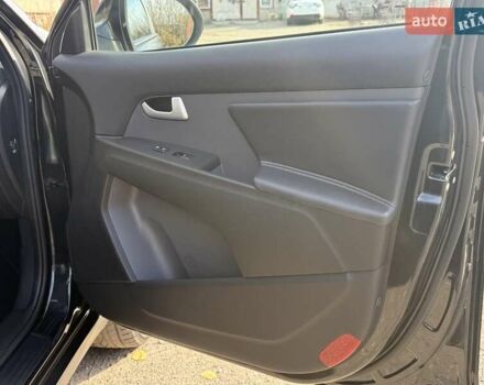 Чорний Кіа Sportage, об'ємом двигуна 2 л та пробігом 147 тис. км за 16900 $, фото 32 на Automoto.ua