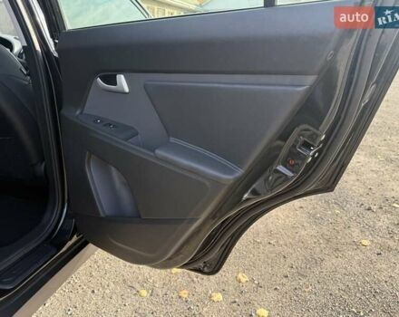 Чорний Кіа Sportage, об'ємом двигуна 2 л та пробігом 147 тис. км за 16900 $, фото 31 на Automoto.ua
