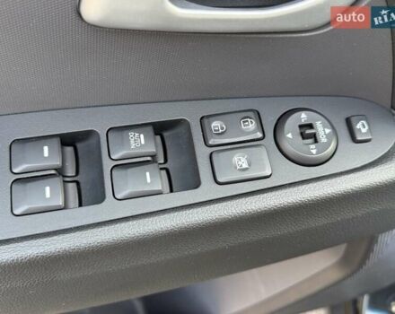 Чорний Кіа Sportage, об'ємом двигуна 2 л та пробігом 147 тис. км за 16900 $, фото 49 на Automoto.ua