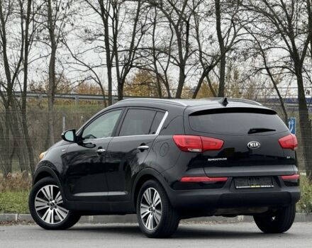 Черный Киа Sportage, объемом двигателя 2.4 л и пробегом 180 тыс. км за 309 $, фото 2 на Automoto.ua