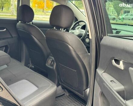 Черный Киа Sportage, объемом двигателя 2.4 л и пробегом 117 тыс. км за 12690 $, фото 13 на Automoto.ua