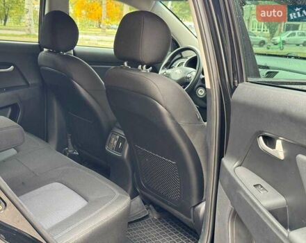 Черный Киа Sportage, объемом двигателя 2.4 л и пробегом 117 тыс. км за 12690 $, фото 13 на Automoto.ua