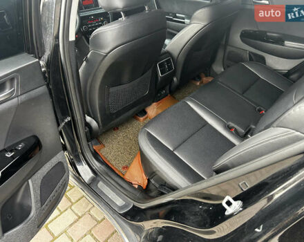 Чорний Кіа Sportage, об'ємом двигуна 2 л та пробігом 176 тис. км за 17600 $, фото 11 на Automoto.ua