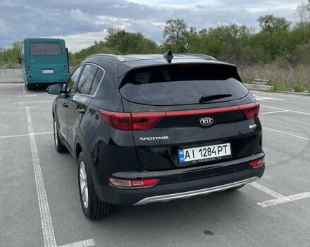 Чорний Кіа Sportage, об'ємом двигуна 2 л та пробігом 178 тис. км за 17900 $, фото 4 на Automoto.ua