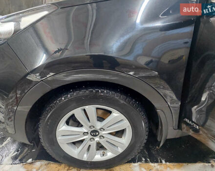 Чорний Кіа Sportage, об'ємом двигуна 2 л та пробігом 83 тис. км за 22000 $, фото 1 на Automoto.ua