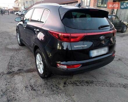 Чорний Кіа Sportage, об'ємом двигуна 2 л та пробігом 83 тис. км за 22000 $, фото 24 на Automoto.ua