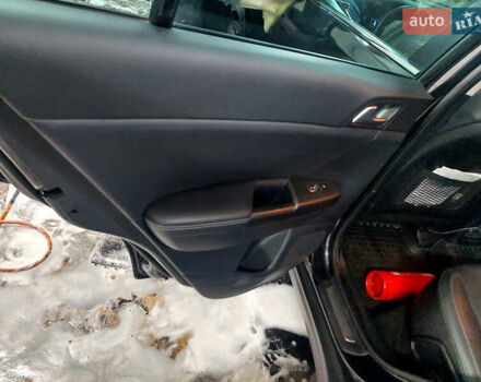 Чорний Кіа Sportage, об'ємом двигуна 2 л та пробігом 83 тис. км за 22000 $, фото 28 на Automoto.ua