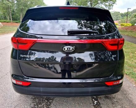 Черный Киа Sportage, объемом двигателя 2.4 л и пробегом 65 тыс. км за 10500 $, фото 5 на Automoto.ua