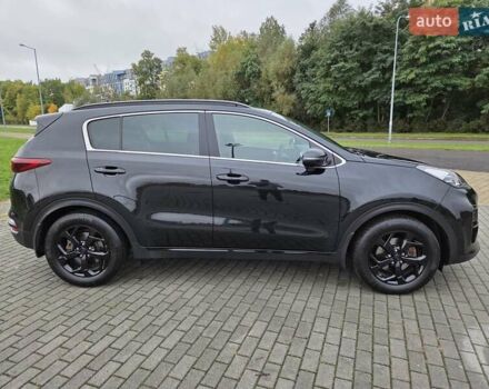 Черный Киа Sportage, объемом двигателя 2 л и пробегом 90 тыс. км за 26000 $, фото 4 на Automoto.ua
