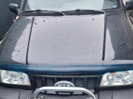 Черный Киа Sportage, объемом двигателя 2 л и пробегом 220 тыс. км за 2000 $, фото 1 на Automoto.ua