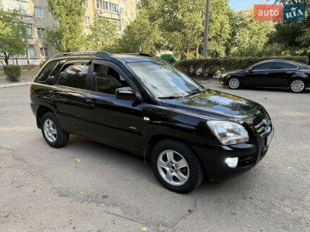Чорний Кіа Sportage, об'ємом двигуна 2 л та пробігом 205 тис. км за 7350 $, фото 1 на Automoto.ua