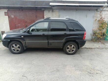 Черный Киа Sportage, объемом двигателя 2 л и пробегом 307 тыс. км за 4800 $, фото 1 на Automoto.ua