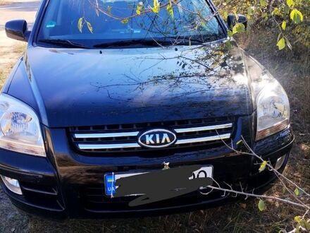 Чорний Кіа Sportage, об'ємом двигуна 2 л та пробігом 197 тис. км за 6900 $, фото 1 на Automoto.ua