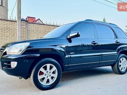 Черный Киа Sportage, объемом двигателя 2 л и пробегом 125 тыс. км за 7499 $, фото 1 на Automoto.ua