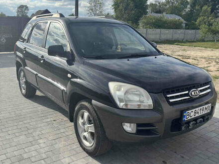 Черный Киа Sportage, объемом двигателя 2 л и пробегом 300 тыс. км за 6800 $, фото 1 на Automoto.ua