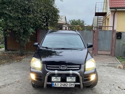 Чорний Кіа Sportage, об'ємом двигуна 2 л та пробігом 227 тис. км за 6900 $, фото 1 на Automoto.ua