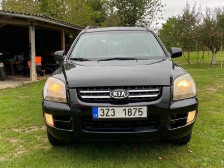 Чорний Кіа Sportage, об'ємом двигуна 2 л та пробігом 256 тис. км за 3899 $, фото 1 на Automoto.ua