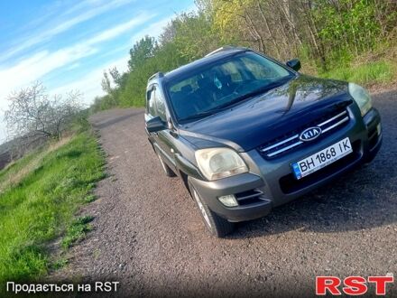 Чорний Кіа Sportage, об'ємом двигуна 2 л та пробігом 209 тис. км за 9000 $, фото 1 на Automoto.ua