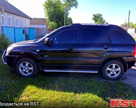 Черный Киа Sportage, объемом двигателя 2 л и пробегом 221 тыс. км за 8000 $, фото 1 на Automoto.ua