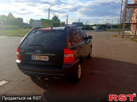 Черный Киа Sportage, объемом двигателя 2 л и пробегом 240 тыс. км за 7500 $, фото 1 на Automoto.ua