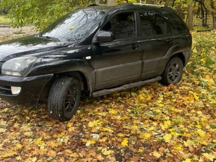 Чорний Кіа Sportage, об'ємом двигуна 2 л та пробігом 301 тис. км за 7300 $, фото 1 на Automoto.ua