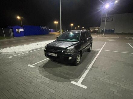 Черный Киа Sportage, объемом двигателя 2 л и пробегом 263 тыс. км за 6700 $, фото 1 на Automoto.ua