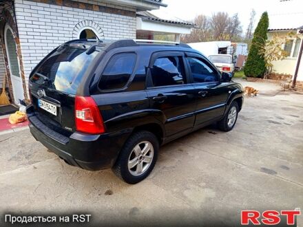 Черный Киа Sportage, объемом двигателя 2 л и пробегом 290 тыс. км за 9100 $, фото 1 на Automoto.ua